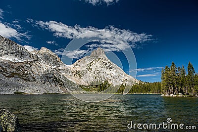 Ragged Peak Sits Behind Young Lakes in Yosemite Stock Photo