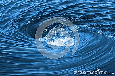 The raging whirlpool Stock Photo