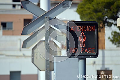 A Rail Crossing Stop Sign For Pedestrians Stock Photo