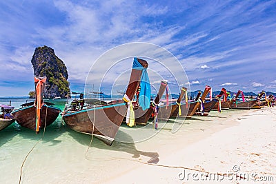 Railay beach with colorful long tail boats in Krabi, Thailand Stock Photo
