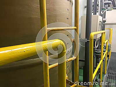 Railing with chemical tank at Deionized water system Stock Photo