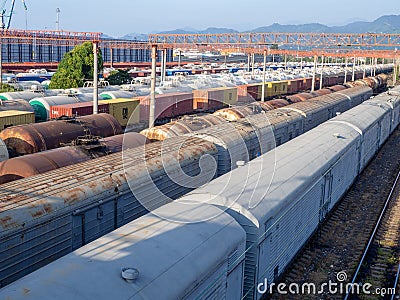 Railroad in the city. Many railway paths. Wagons and trains on the tracks. unloading station. Tank wagons Editorial Stock Photo