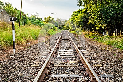 Railroad crossing and blue sky. Perspective line view Stock Photo
