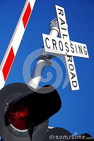 Railroad Crossing Guard and Lights Stock Photo