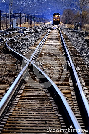 Railroad line tracks with locomotive engine Stock Photo