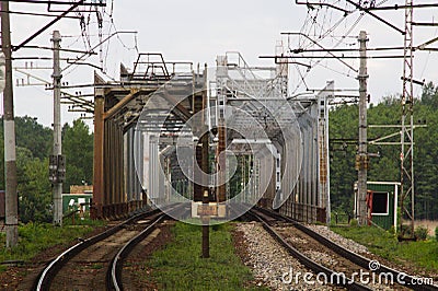 Railroad metal bridge two ways parallel tracks Stock Photo