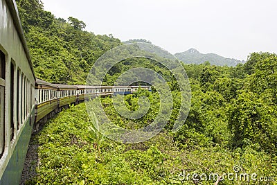 Railroad through the mountains with Forest Stock Photo