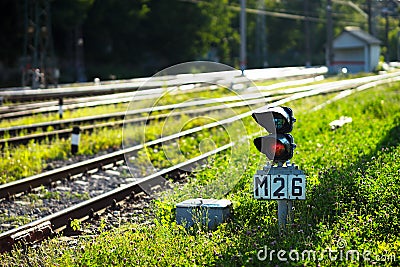 Railroad semaphore with diagonal railway background Stock Photo