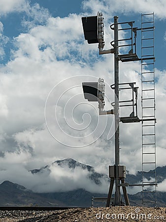 Railroad signal lights in the Mohave Desert Stock Photo