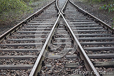 Railroad splitting - rail tracks split Stock Photo