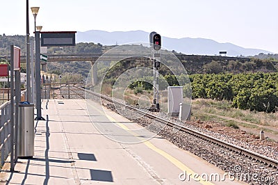 Railroad station in the middle of the field a sunny day Stock Photo