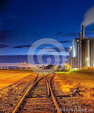 Railroad switch in Industrial area Stock Photo