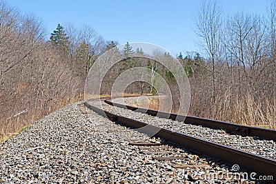 Railroad tracks leading to bend Stock Photo