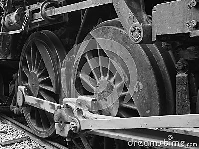 Railroad train steam engine drive wheels in black and white Editorial Stock Photo