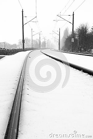 Rails in foggy snow Stock Photo