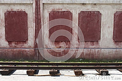 Rails and wall Stock Photo