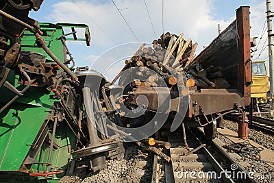 Railway accident. Freight cars derailed. Destruction of railway infrastructure. Destruction of rolling stock. Wagons carrying wood Stock Photo