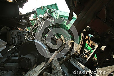 Railway accident. Freight cars derailed. Destruction of railway infrastructure. Destruction of rolling stock. Wagons carrying wood Stock Photo