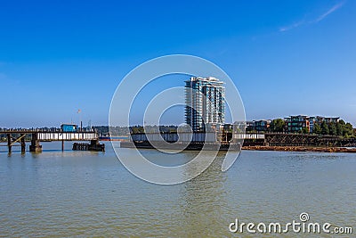 Railway Bridge at the Background of a Residential District Stock Photo