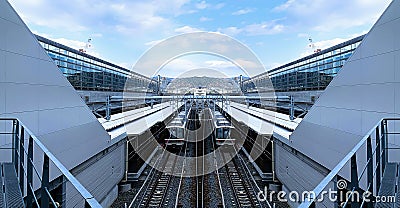 The railway platform in the train station Stock Photo