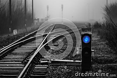 Railway signal with blue light Stock Photo