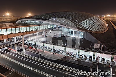 Railway station at Beijing Capital Airport Terminal 3 at night Stock Photo