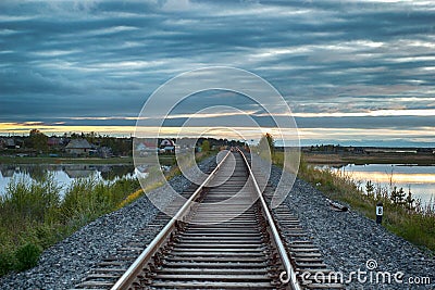 Railway stretches into the distance Stock Photo