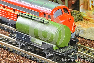 Railway tanker truck. Train hobby model on the model railway. Close-up Editorial Stock Photo