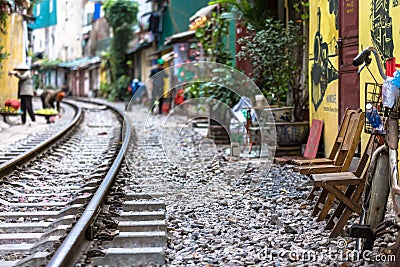 Railway track in back lane alley amazing for tourist in Hanoi Vietnam Indochina Editorial Stock Photo