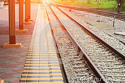 Railway track on gravel for train transportation with sunset light tone Stock Photo