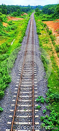 Railway track between two forest in tripura state, India country Stock Photo