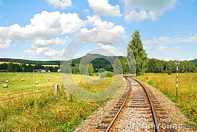 Railway tracks in a beautiful countryside Stock Photo