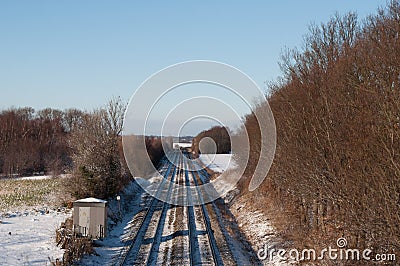 Railway tracks in Danish winter landscape Stock Photo
