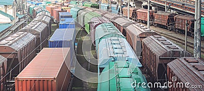 Railway wagons with cargo of metal and grain in port of Odessa. trains are waiting in line for loading at cargo terminal. Stock Photo