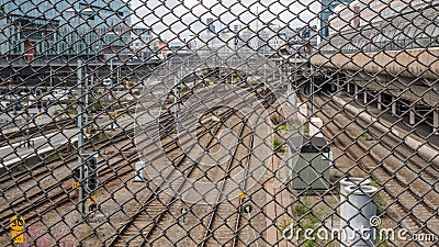 Railways at Stockholm train station seen from above through rabitz grid Stock Photo