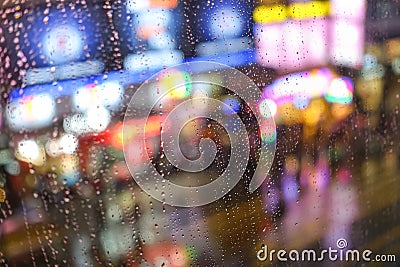 Rain abstract background with defocused lights bokeh Stock Photo