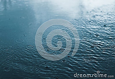 Rain, autumn, weather concept - puddle and splashing water in rainy Stock Photo
