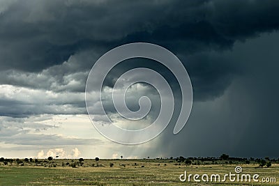 Rain cloud over Africa landscape Stock Photo