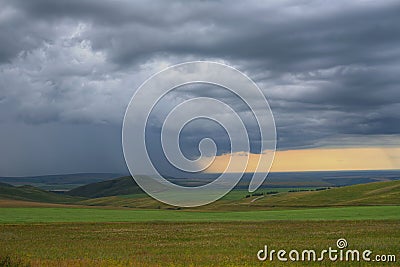 Rain on a distant plane Stock Photo