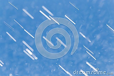 Rain drops on a background of blue sky Stock Photo