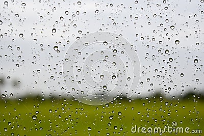 Rain drops on the windshield, Abstract blur background Stock Photo