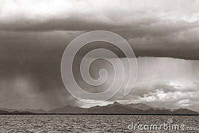 Rain falling over Lake Titicaca, Peru Stock Photo