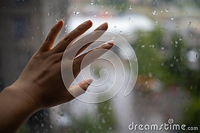 Rain on glass. Raindrops on window glass. Selective focus. Rainy city background Stock Photo