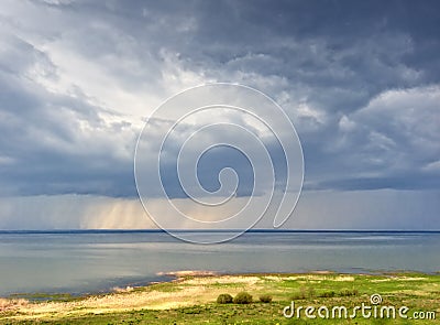 Rain over lake Stock Photo