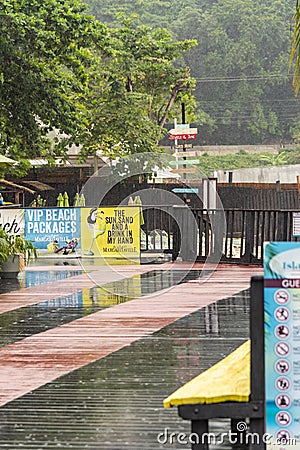 Rain on the pier port of Ocho Rios Jamaica Editorial Stock Photo