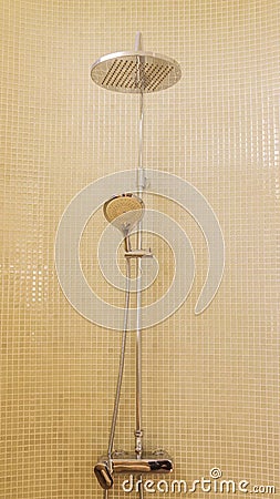 Rain shower in luxury bathroom with mosaic tile Stock Photo