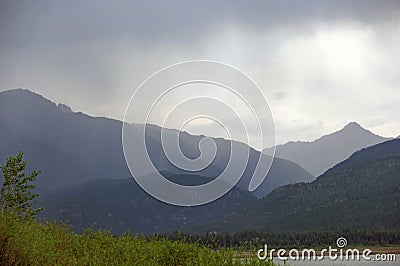 Rain storm coming to lake in Colorado Mountains Stock Photo