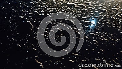 Rain water on the car at nite Stock Photo