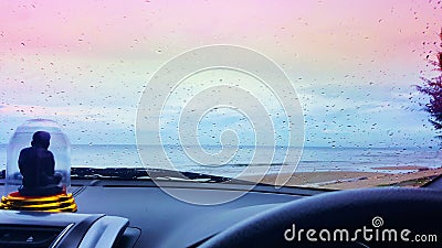 Rain on the windshield on a rainy day. Sea view The Buddha in Cha Am, Thailand Stock Photo