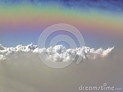 Rainbow Above the Clouds Stock Photo